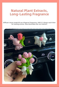 Detail of pink rabbit and tulip gypsum diffuser stones for car vent decoration