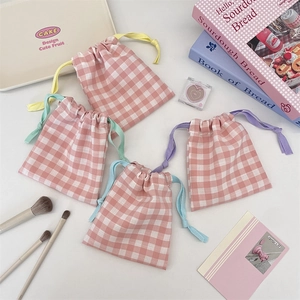 Pink checkered drawstring bags set in four colors for cosmetic and jewelry storage
