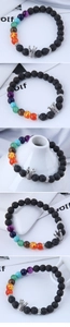 Close-up of volcanic stone bracelet with colorful chakra beads and silver crown detail