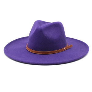 Detail of deep purple wide brim wool fedora with brown leather band and silver rivet