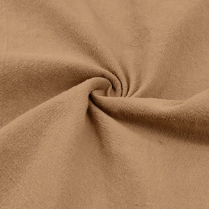 Close-up of khaki linen fabric texture showing natural breathable fiber weave