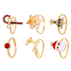 Detail of 6-piece Christmas ring set with elk and tree motifs in gold alloy finish