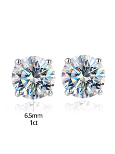 Macro shot of 1ct 6.5mm moissanite stud earrings in 925 sterling silver with mirror reflection