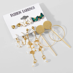 6-piece gold earring set with faux pearls, butterfly charms, and heart studs on card