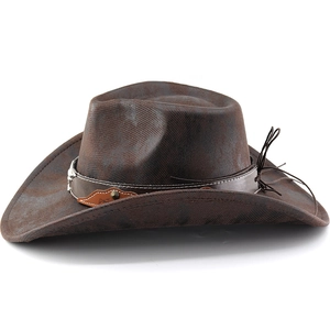 Detail of dark brown faux leather cowboy hat with metal studs and decorative band