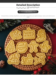 Detailed view of 10 assorted Christmas cookie molds in a festive woven tray setup