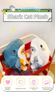 Detail of creative shark cat plush dolls in blue and purple sitting in a red shopping cart