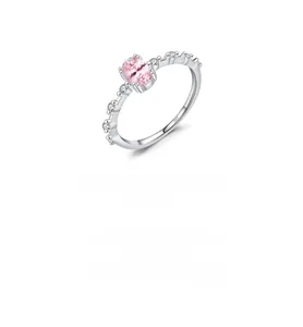 Detailed macro view of S925 sterling silver ring with oval pink crystal and micro diamonds