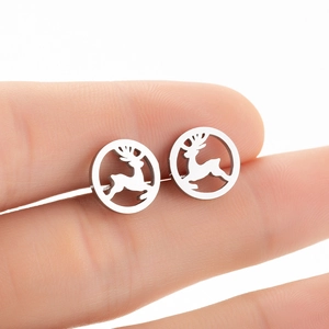Close-up of silver elk reindeer earrings in a circular frame held by hand for size