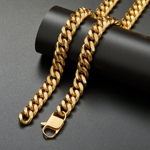 Men gold stainless steel cuban link chain necklace detail close-up view accessory fashion
