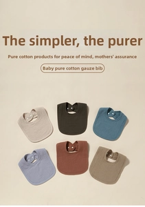 Close-up of soft multi-layer cotton muslin baby bibs in various Morandi colors