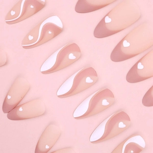 Morandi pink and purple press-on nails with heart patterns and wavy lines matte finish