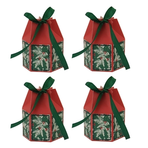 Set of four red Christmas candy boxes with green ribbons and pine patterns on white background