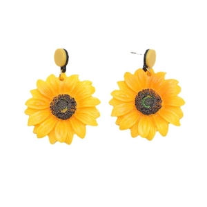 Fashionable yellow sunflower stud earrings with realistic resin petals on white background