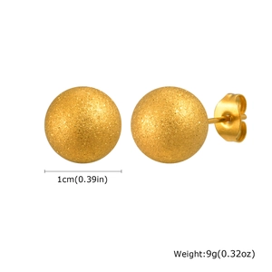 Detailed view of matte gold ball earrings showing 1cm diameter and 9g weight dimensions
