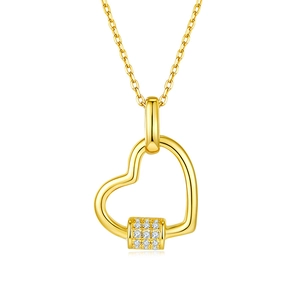 Detail of gold heart pendant with micro-pave cubic zirconia on delicate S925 silver chain