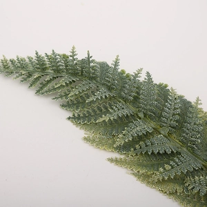 Artificial evergreen pine leaves with realistic frosted green texture for Christmas decor