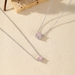 Sparkling S925 sterling silver necklace featuring a pale pink rose-cut single diamond pendant