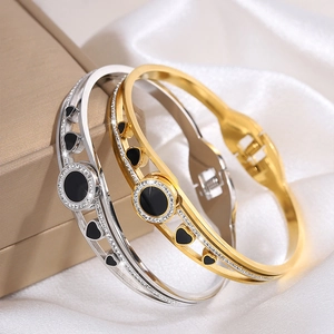 Chic titanium steel open bracelet with heart accents and crystal studs on white silk