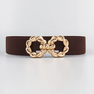 Close-up of a wide brown elastic waist belt with a gold metallic double-ring buckle