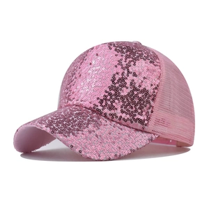 Detail shot of pink sequin mesh baseball cap featuring glitter texture and breathable net