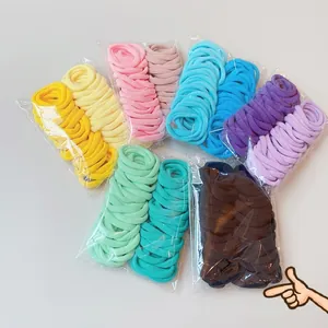 Close-up of seamless high-elastic hair ties in various candy colors showing high durability