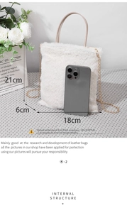 Detailed size comparison of small white faux fur handbag with measurements and smartphone