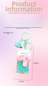 Detail view of rabbit ice cream keychain with size dimensions and blue bead infill