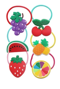 Detailed view of colorful elastic hair bands set with soft rubber fruit decorations