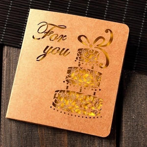 Vintage kraft paper greeting card with laser-cut cake design and For You text