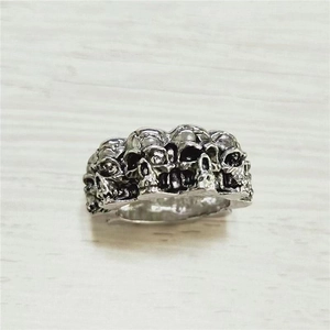 Retro gothic skull ring in vintage silver finish with punk style embossed patterns