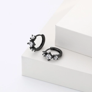 Detail view of black square zircon hoop earrings with white crystals on white backdrop