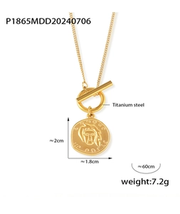 Macro shot of gold-plated portrait pendant with OT clasp and detailed dimensions