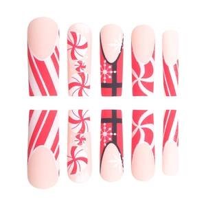 Christmas red glitter press-on nails with festive bow, candy stripes and snowflake patterns