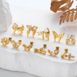 Chic gold-plated cartilage studs featuring butterfly, bow, and clover with zircon inlay