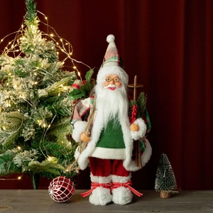 Close-up of 12-inch standing Santa Claus figurine with ski poles and pine berry details