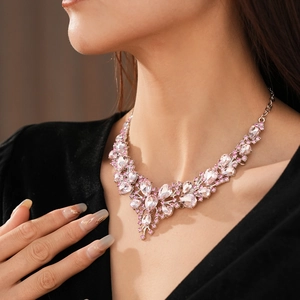 Detailed view of luxury vintage rhinestone water drop necklace with pink crystals