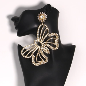 Western style long butterfly flower drop earrings with sparkling rhinestones in gold finish