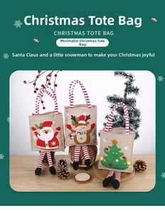 Close-up of Christmas gift bags featuring Santa, reindeer and tree with hanging legs