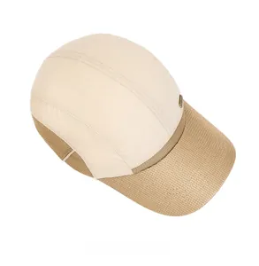 Top view of breathable mesh sun hat with beige and khaki panels and metal logo detail