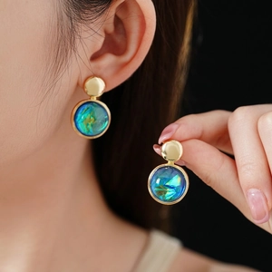Golden round resin drop earrings with iridescent blue-green texture for women