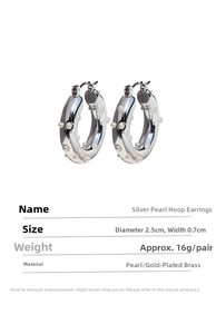 Detail view of silver pearl hoop earrings with dimensions showing 2.5cm diameter and 0.7cm width