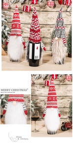 Detail of Christmas gnome wine bottle covers with knitted snowflake patterns and faux fur