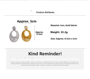 Detail view of woven velvet oval earrings in gold and silver showing size and 33.2g weight