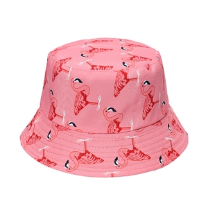 Pink flamingo print bucket hat for women with wide brim and reversible sun protection design
