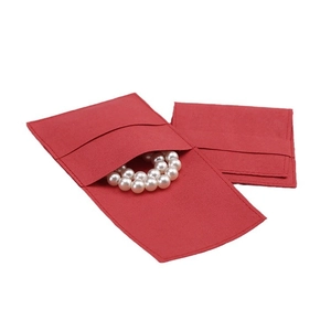 Dark red microfiber jewelry pouch with an envelope-style flap and luxury suede texture