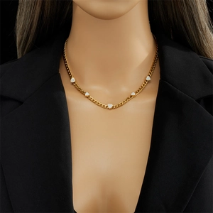 Golden titanium steel chunky chain necklace featuring five sparkling crystal heart charms