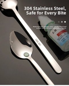 Close-up of 304 stainless steel baby spoon with serrated edge for scraping fruit puree
