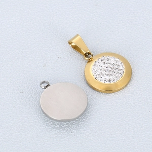 Polished stainless steel circular pendant with sparkling rhinestones in gold and silver