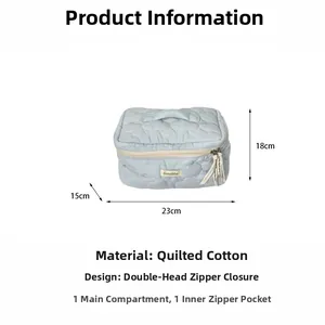 Blue quilted cotton cosmetic bag detail showing 23x15x18cm size and dual zipper layout